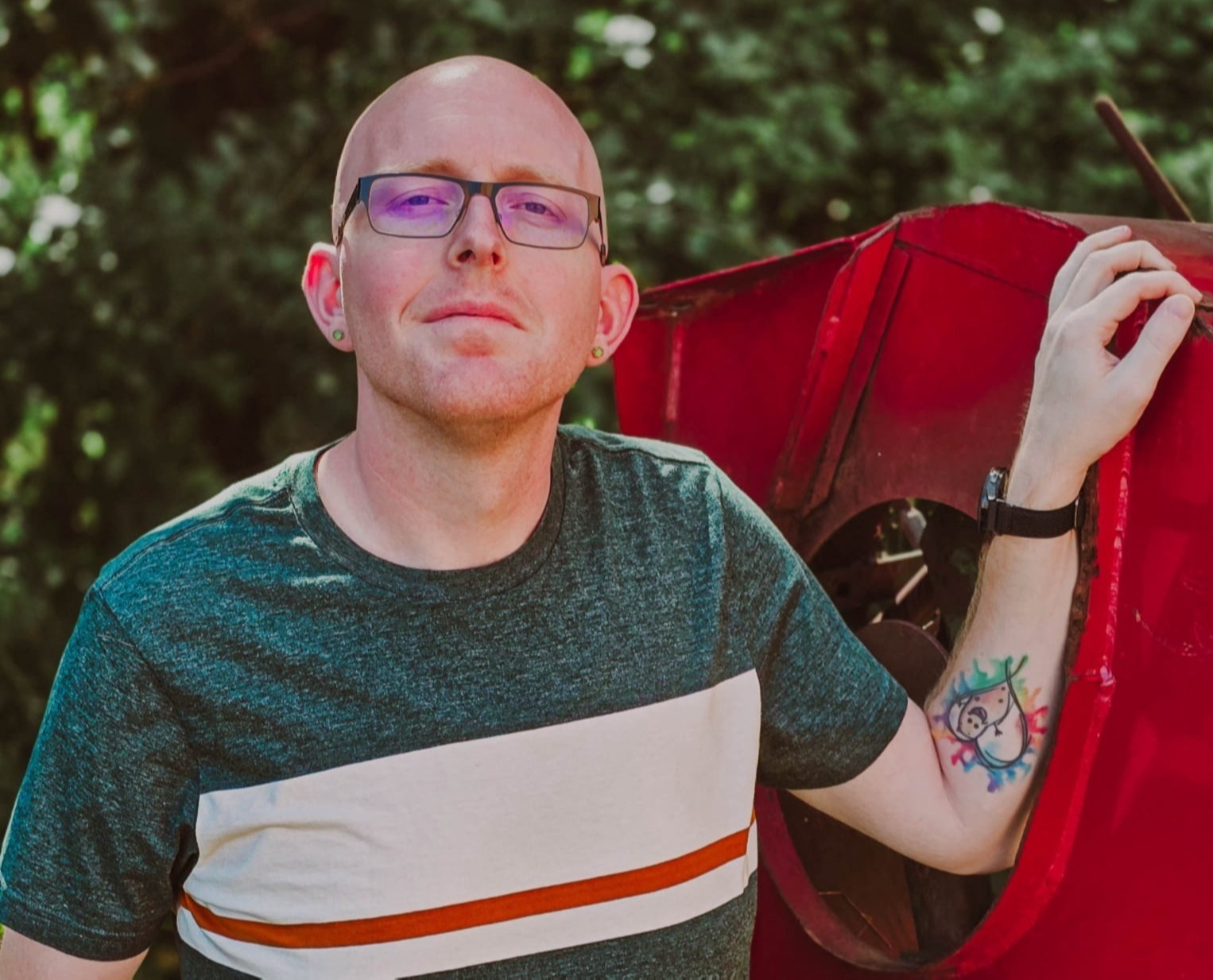 Chad, standing next to red structure